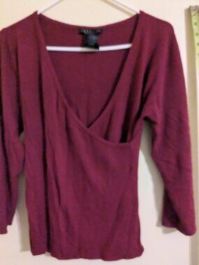Burgundy wrap sweater.